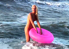 Hot naked blonde on the beach