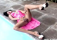 Hawt brunette hair lesbians masturbating their snatches outdoors at the poolside