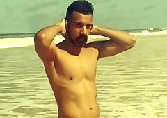 Naturist Beach - Dan bare and rock hard jacking off on the beach teaser