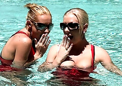 Sweet blonde with silicone tits Brit is jumping on a pretty huge dick