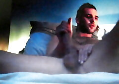 Awesome hot dude jerking his huge cock on cam