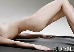 Breasty youthful girl working out during the time that topless! Alisa is a charming playgirl who likes teasing whilst alone!