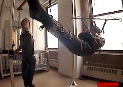 Suspended In Leather Straitjacket Sack