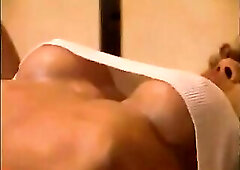 aged female bodybuilder drilled on bench