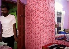 Singaporean beauty in gold jewelry shares passionate moments with her lover in a floral bedroom