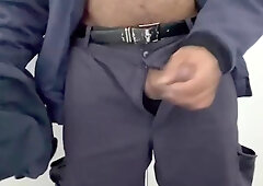 Security guard ejaculated on his work uniform in a public rest room.