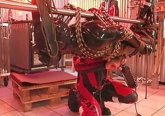 Pleasure-filled finale for bondage and spanking enthusiasts in latex