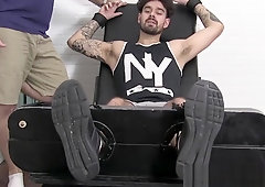 Tattoo jock Casey has feet torment in softcore bondage