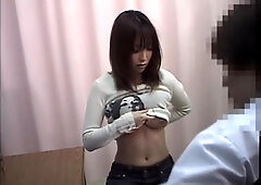 Busty Japanese has some fun during her kinky pussy exam