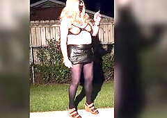 I crossdressed in my ebony leather miniskirt, ebony nylon hose, ebony brassiere and lengthy golden-haired hair and high heel open shoes. As I got clot