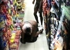 Slutty ebony girl has sex with a black guy in a public place