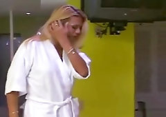 Tanned blonde shemale doing a male model