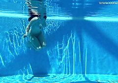 Alluring busty hottie Sheril Blossom plays with her boobies underwater