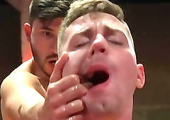 Muscular gay studs wrestling while naked