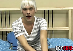 Young gay man playing with his dick during an interview