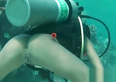 Flawless stunner is displaying her opened slim pussy in close up