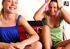 Pale blonde and tanned brunette lesbians