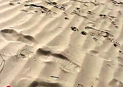 T-girl shows her manicured feet and booty at the beach