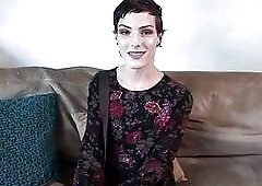 Cute short-haired TS jerks her big dick on casting couch