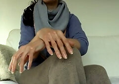 Elegant brunette Victoria Valente shows off her lovely hands and long nails in a cozy cashmere outfit