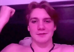 Teenager Oliver Ivy is cropped by Jes Cox while bound to a couch.