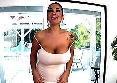 A milf with some amazing curves is getting on her knees to suck dick