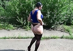 A chubby milf in stockings loves to strip in public or go panties-free outdoors. Foot fetish and exh