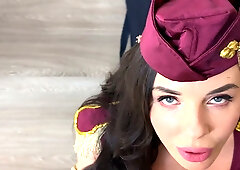 Russian flight attendant in uniform gives blowjob and rides client for cumshot