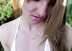 Public oral-sex Outdoor. Wench in a micro-bikini sucked a ally in the park