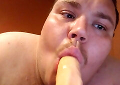 Giant guy fellating a fuck stick