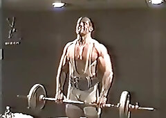 A Guy Lifting Weights And Then Jacking Off In A Wrestling Ring