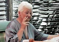 Granny smokin' and fingering her old twat