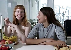 Redhead and dark haired lezzy play in kitchen with vagina