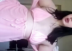 A nice-looking woman bare in nature's garb for a slutty audience.