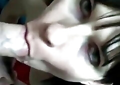 Lustful brunette shemale gives a wet blowjob and gets facialized