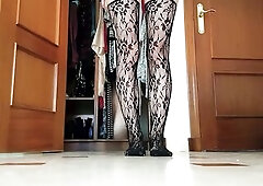 Trying on, modelling and taking off nylon fishnet nylons, close up view of hawt feet and legs wearing patterned nylons