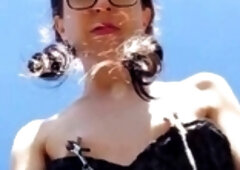 Outdoor BDSM Solo in Black Dress with Nipple Clamps and Butt