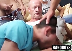 dude wearing mask fellates as many stiffys as he can at party