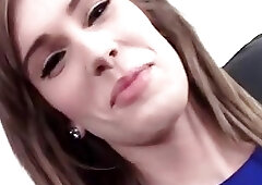 Skinny t-girl cutie laughs while posing and riding a dildo