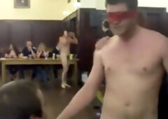 College men wrestle naked in classroom