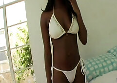 Luscious ebony beauty savors beach pickup in vintage ecstasy