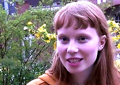 Sexy redhead stunner uses a gigantic fake penis for solo