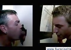 Hunk finds warm mouth through gloryhole