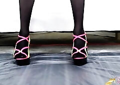 The gorgeous Stefani Specific in ebony hose shows her feet and pees