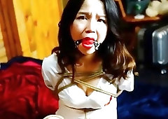 Tied up Asian nurse gets tickled by master BDSM porn