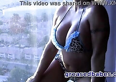Golden-haired with Large Bazookas Removes Bikini and Gets Oiled Up