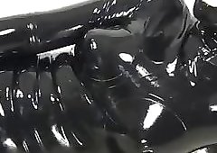 Rubber Girl gives Sexy Blowjob