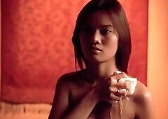 Unknown Asian milf revealing her boobs