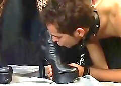 Shemale mistress plays with her slave and gives him footjob