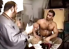 Muscle Bear Construction Worker gets blowjob from photographer